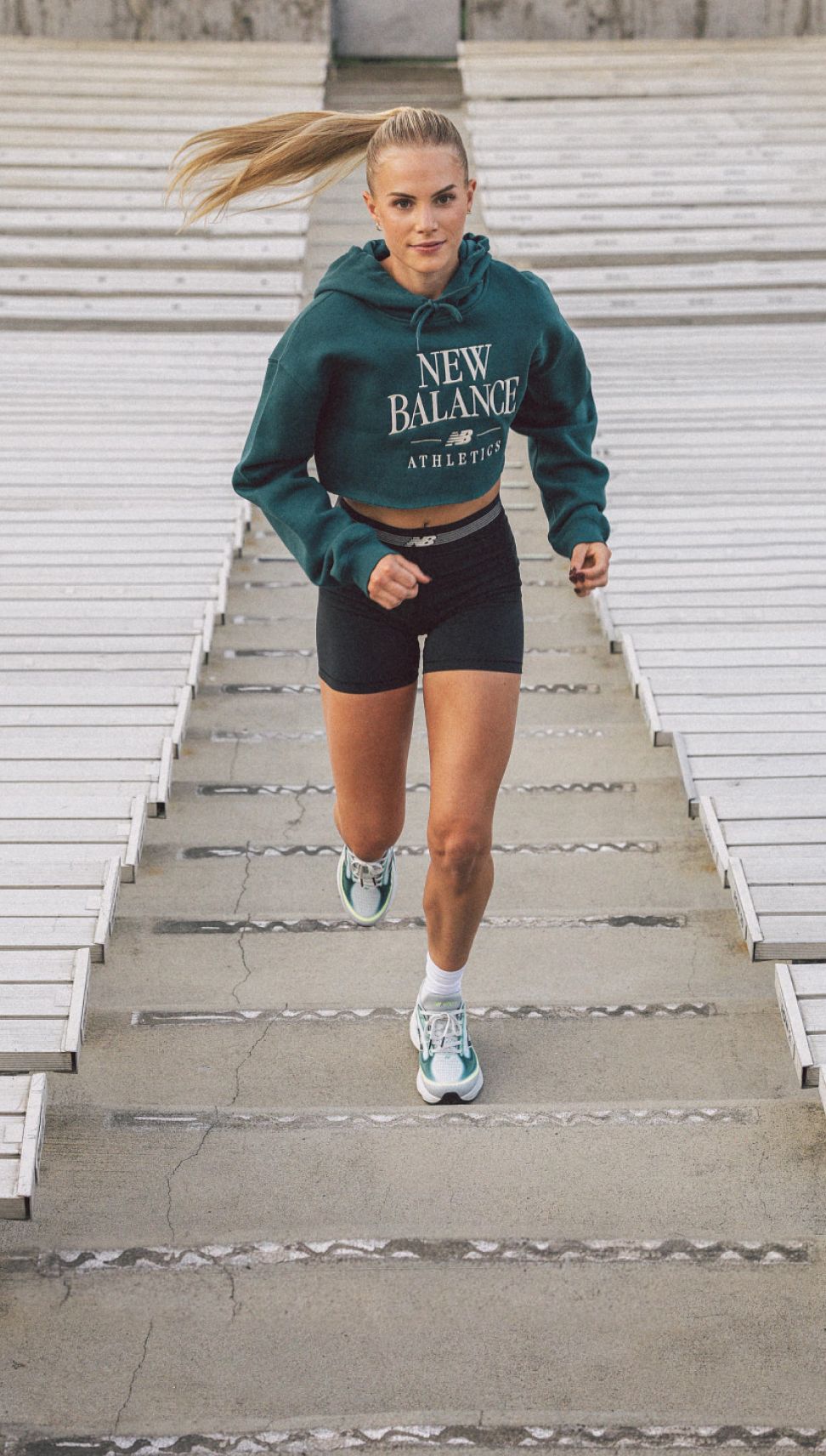 Parker Valley running up bleacher stairs